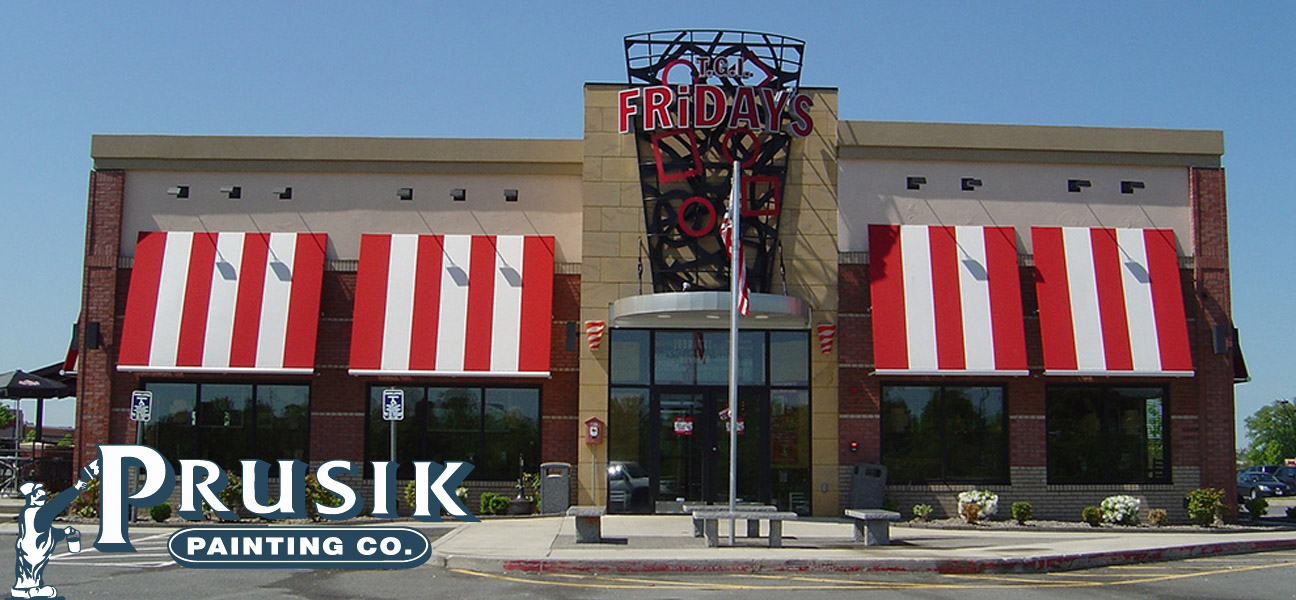 An exterior shot of a TGI Friday's that just received a fresh coat of exterior paint.